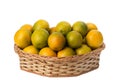 Oranges in wicker basket on isolated white background Royalty Free Stock Photo