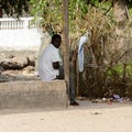 Unidentified local man sits on the sangar in the Etigoca villag Royalty Free Stock Photo