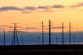 Cloudy sunset in dusk with windmills silhouettes and cloudes Royalty Free Stock Photo