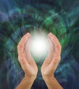 Orb Light Paranormal Phenomenon between hands Royalty Free Stock Photo