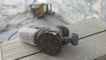 An orbital sander laying on its side with a 12 inch sanding disc attached Royalty Free Stock Photo