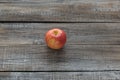 Orcanic red apple on wooden boards background. Autumn concept Royalty Free Stock Photo