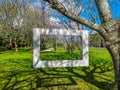 Orchard trees alley with white photo frame in the sunny afternoon Royalty Free Stock Photo