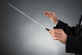 Orchestra Conductor Holding Baton Royalty Free Stock Photo