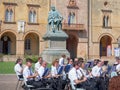 Orchestra Performing Outdoors right in Front of Rocca Pallavicino and the Statue of Giuseppe Verdi, Italian Composer, Parma, Italy Royalty Free Stock Photo