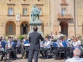 Orchestra Performing Outdoors right in Front of Rocca Pallavicino and the Statue of Giuseppe Verdi, Italian Composer, Parma, Italy