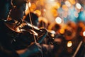 An orchestral musician plays the violin in a symphony orchestra at a concert. Close-up