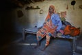 Orchha, India, November 28, 2017: Old woman sitting in her bed