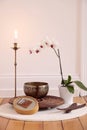 Orchid candle and decoration Royalty Free Stock Photo