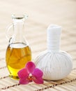 Orchid, jar with oil and massaging ball Royalty Free Stock Photo