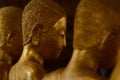 Ordained female monks or Bhikkuni surround Buddha`s sculpture.These are some of the oldest and rarest Bhikkuni statues found in th Royalty Free Stock Photo