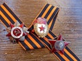 Order `Great patriotic war`, order `Red Star` and sign of `Guards` on the background of the St. George`s ribbon. Heirloom. Memory.