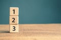 1, 2, and 3 priority numbers by wood cubes Royalty Free Stock Photo