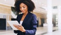 In order to be successful, you have to keep working. Cropped shot of an attractive young businesswoman standing alone