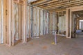 In order to provide sound and thermal insulation, mineral fiberglass wool is installed between beams of the wall framing