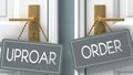 Order or uproar as a choice in life - pictured as words uproar, order on doors to show that uproar and order are different options Royalty Free Stock Photo