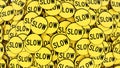 Ordered Pile of Yellow Slow Signs