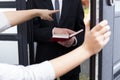 Ordering Jehovah's witness to go out Royalty Free Stock Photo