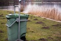 Green Garbage Bin Trash in the Forest Grass Water Nature Object