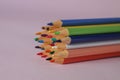 Ordinary colored wooden pencil different colors for drawing and creativity, close up of pencils after sharpening and using. School Royalty Free Stock Photo