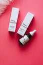 the ordinary cosmetics on pink background .