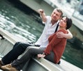 Ordinary couple in love posing outdoors together