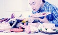 Man posing with a plate of cold cuts Royalty Free Stock Photo