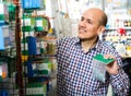 Man choosing nails and screws Royalty Free Stock Photo