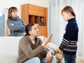 Ordinary parents berating teenager son Royalty Free Stock Photo