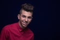 Ordinary portrait, one teenager boy, red shirt, Caucasian, dark