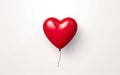 Ordinary red heart shaped latex balloon isolated on white background Royalty Free Stock Photo