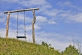 ordinary wooden swing Royalty Free Stock Photo