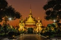 Ordination Hall next to a Buddhist temple Wat Arun in Bangkok.Thailand landmark.Colorful porcelain statues. Temple guardian