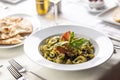 Orecchiette con pesto genovese e speck tirolese, Italian pasta with pesto and Tyrolean bacon