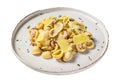 Orecchiette pasta with pancetta, egg, hard parmesan cheese and cream sauce. Isolated on white background, Top view. Royalty Free Stock Photo