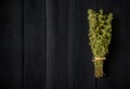 Oregano on wooden black table