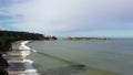 Oregon Coast shoreline in Charleston, lighthouse in background