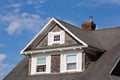 Oregon Coast typical faÃÂ§ades: wooden whingles, weathered, white windows. Pacific coast properties