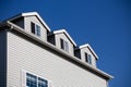 Oregon Coast typical faÃÂ§ades: wooden whingles, weathered, white windows. Pacific coast properties