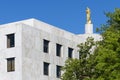 Oregon Pioneer in gold atop the Oregon State Capitol building in Salem Royalty Free Stock Photo