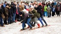 Orel, Russia, February 18, 2018: Maslenitsa carnival. People playing in snowy square