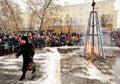 Orel, Russia, February 18, 2018: Maslenitsa carnival. People watch burnt Lady Maslenitsa