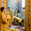 Orel, Russia, July 28, 2016: Russia Christianization anniversary Divine Liturgy. Priests bow in Orthodox church altar Royalty Free Stock Photo