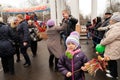 Orel, Russia - March 13, 2016: Maslenitsa, Pancake festival. Girl with straw Lady Maslenitsa doll and people dancing