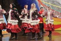 Orel, Russia - March 13, 2016: Maslenitsa, Pancake festival. Girls dancing in Russian traditional winter suits