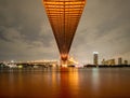 Oreng led light under the bridge over the river On a cloudy day in the sky. Bhumibol Bridge, Samut Prakan, Thailand Royalty Free Stock Photo