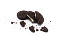 Oreo Biscuits with broken and crumbs isloated on white background. It is a sandwich chocolate cookies with a sweet cream.