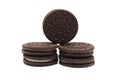 Oreo Biscuits isolated on white. Pile of sandwich chocolate cookies different filling with sweet cream, Peanut butter a