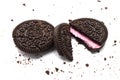 Oreo Biscuits some cracked and crumbs on white. It is a Biscuits Chocolate sandwich cookies with strawberry flavored cr Royalty Free Stock Photo