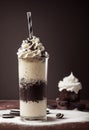 Oreo milkshake with whipped cream sprinkles and straw Royalty Free Stock Photo